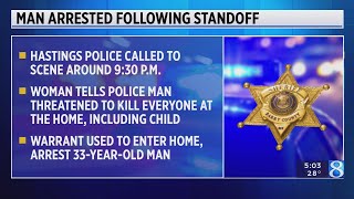 Man arrested after threatening woman, infant, officers with compound bow