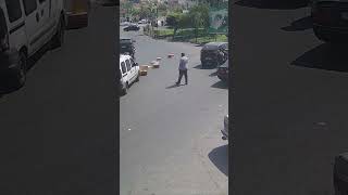 Boxes Fall Out of a Van as It Speeds Away