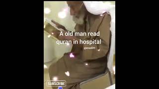 a old man read quran in hospital Resimi