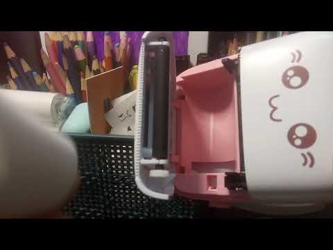 How do I change the paper roll of my printer.