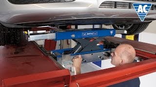 : Automatic air hydraulic jacking beam
