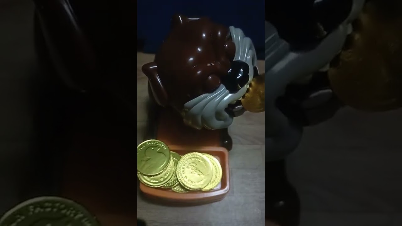 mad dog toy don't take his  chocolate coins! 
