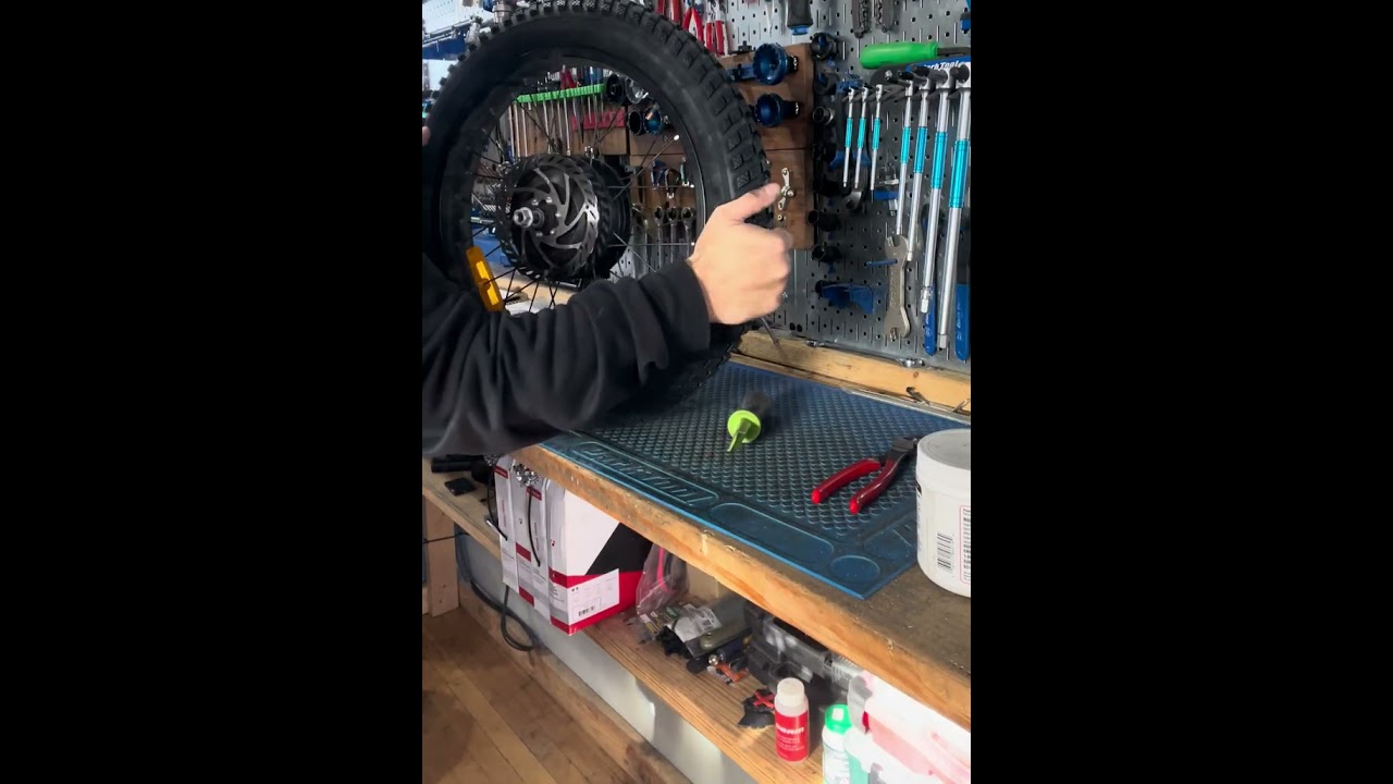 E-bike rear hub motor wheel removal, and tire swap to a more aggressive 20 x 3.0 tire.
