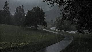 Rain on grass creates a peaceful and natural soundscape, perfect for deep sleep, relaxation