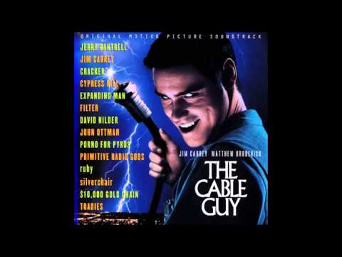 The Cable Guy - Primitive Radio Gods - Standing Outside a Broken Phone Booth with Money in My Hand