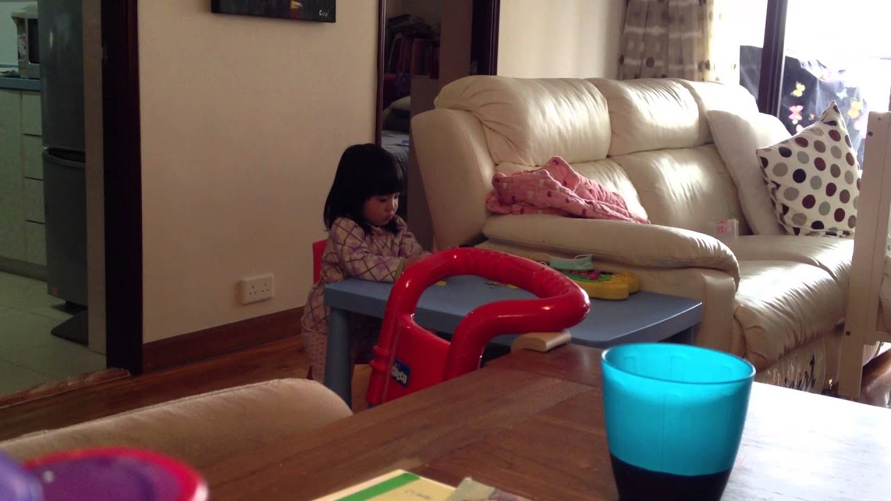 Toddler Lauren pretending to talk to someone on a toy phone - YouTube
