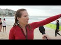 ‘This is our place’: hundreds form human circle on the beach and ocean at Bondi beach vigil