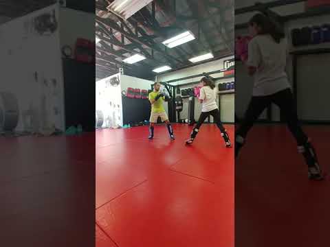 12 year old Muay Thai girl kicks 21 year old Tai Kwon Do man in nuts.