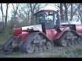 Case Quadtrac pulls John Deere bulldozer out of the mud
