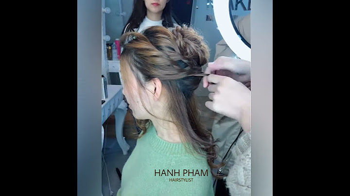 Kiểu tóc búi cao top knot cho chàng mặt tròn năm 2024