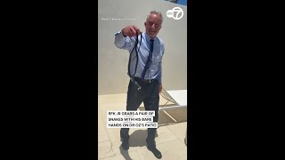 RFK Jr. grabs a pair of snakes with his bare hands on Dr Oz's patio
