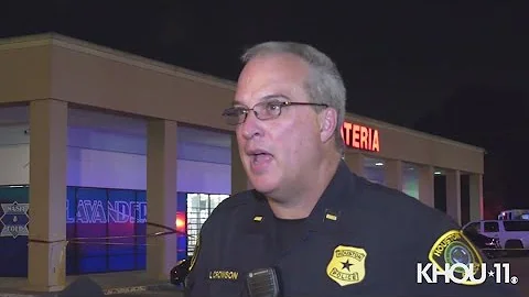 Raw Video: Security guard shoots and kills man outside of a washateria, police say