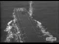 Aerial views of escort carrier USS Sicily (CVE-118)