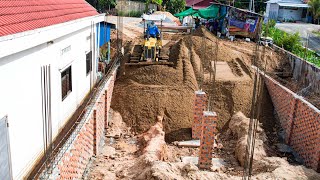 New work sand filling in the fence making foundation house using dozer push sand&dump truck loading