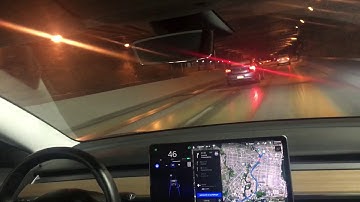 Navigate on Autopilot handles cars merging in and takes tight exit in underpass V9 2018.42.4