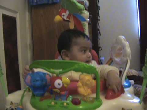 Ayaan on his Jumperoo at 6months