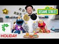 Sesame Street: Mac & Cheese Cups for New Years! | Cookie Monster Snack Chat with Joel Gamoran