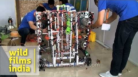 Robot being repaired by participants during ABU Robocon 2014, Pune