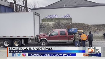 Semi-truck gets stuck under Champaign viaduct