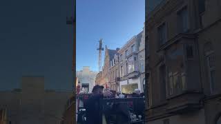 Bands marching down Menen Straat to the Menin Gate in Ypres on Remembrance Day 11.11.2023