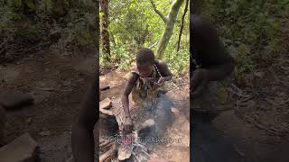 Hadzabe Tribe cook their food naturally over fire in the forest