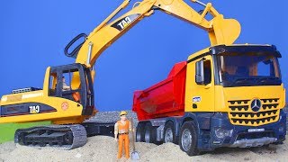 Escavadeira e caminhão basculante em uma caixa de areia screenshot 2
