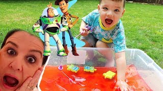 Caleb and Mommy Pretend Play with Toy Story 4 Fishing Pole and Slime Baff