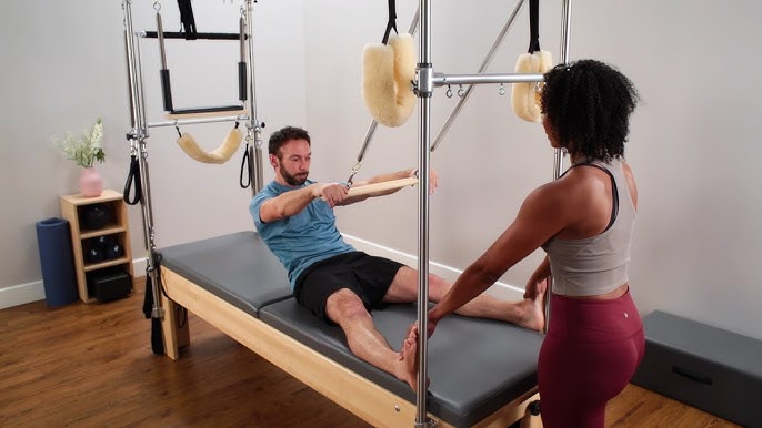 Pilates Reformer with half Trapeze Workout - Exercise: Roll Back