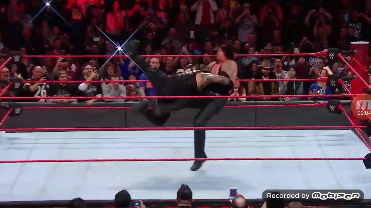 roman reigns spear the undertaker youtube
