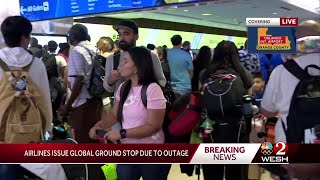 Long lines at Orlando International Airport after global tech outage