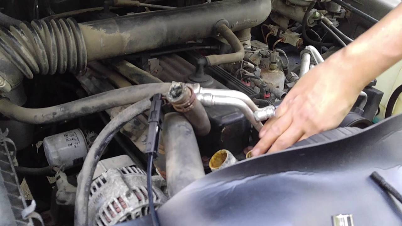 2000 Jeep Wrangler Sahara thermostat housing cover, how to change - YouTube