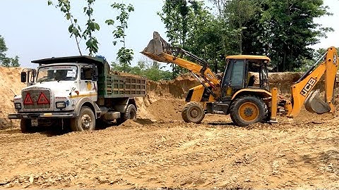 JCB Backhoe Loader Working In Village Area - JCB Loading Soil in Tripper