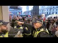 Uk police barricade themselves in train station as propalestinian protesters have sitin protest