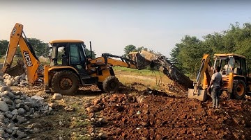 Two JCB Machine Breaking and Throwing out Old Concrete Culvert Slab For Bridge Construction