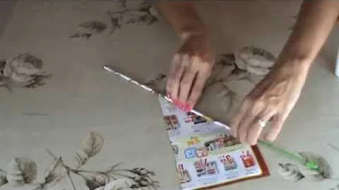 Como fazer uma lança com jornal?