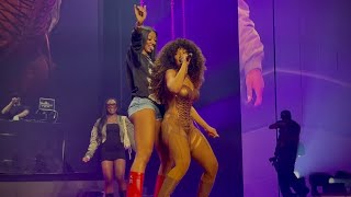 Angel Reese with Megan Thee Stallion on Stage 