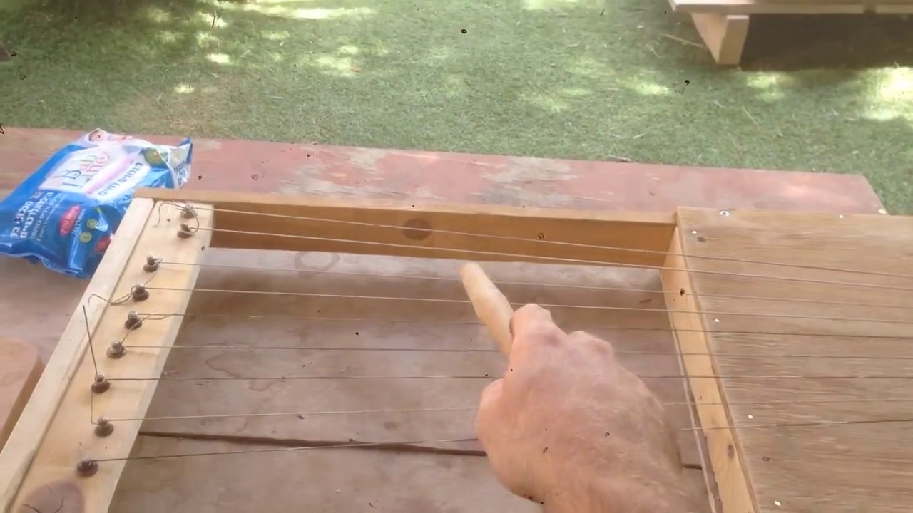 Home made string tapping instrument - YouTube