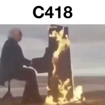 guy playing piano on fire c418 meme