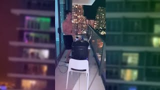 Guy blasting Caramelldansen on his balcony