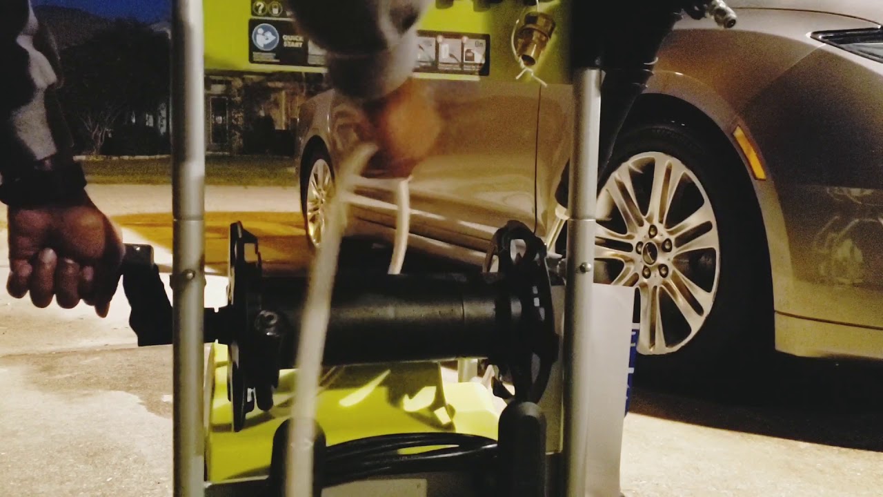 How to roll up the hose on a Ryobi 2000 PSI pressure washer. 