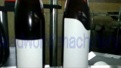 video of wine bottle double sides labeling machine from coco on August 17 2016