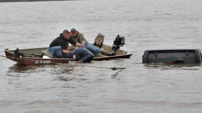 Missing woman found alive in almost completely submerged vehicle