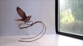 I made this bird from copper sheet and wire; 8" tall.