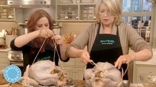 Martha stewart and jennifer koppelman hutt stuff truss a thanksgiving
turkey with porcini dressing. brought to you by stewart:
http://www.marthast...