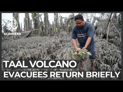 Philippines volcano: Evacuees return to collect belongings