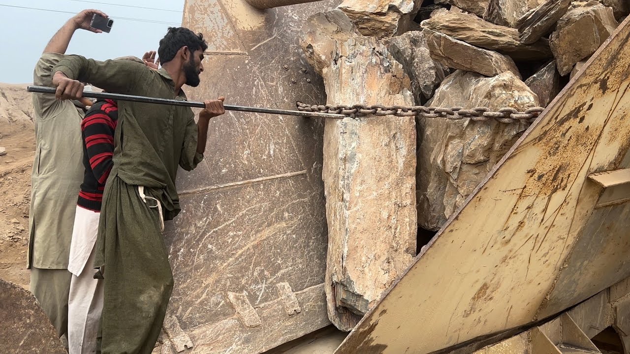 How to break large rocks without Machines? - YouTube