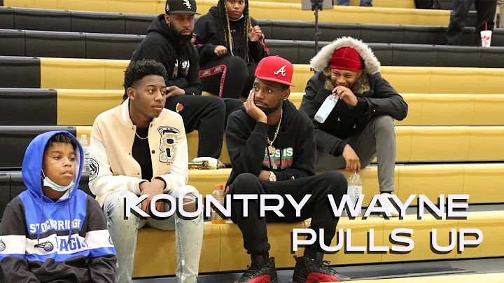 Kountry Wayne watches son Temar Colley HOOP.  Unio...