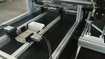 Automatic book style box assembling machine: testing before shipment to Korea