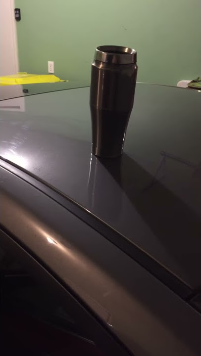Coffee mug on roof of my car