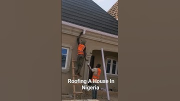 Roofing A House In Nigeria With Gutter Connector by Pramew Builders And Construction Ltd.
